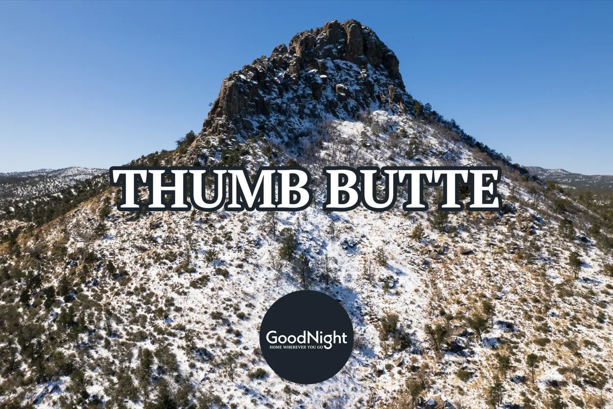 A dramatic exterior shot featuring Thumb Butte, Prescott’s iconic rock formation, against a snow-dusted landscape and vivid blue sky. The natural terrain and sweeping views highlight opportunities for hiking, exploration, and wildlife spotting in the region.